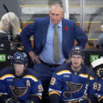 
              St. Louis Blues coach Craig Berube watches players during the second period of the team's NHL hockey game against the Boston Bruins, Monday, Nov. 7, 2022, in Boston. (AP Photo/Charles Krupa)
            
