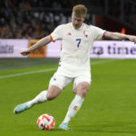 FILE - Belgium's Kevin De Bruyne during the UEFA Nations League soccer match between the Netherlands and Belgium at the Johan Cruyff ArenA in Amsterdam, Netherlands, on Sept. 25, 2022. FIFA has denied Belgium's request to wear team jerseys with a 'Love' label at the World Cup in Qatar. The Belgian soccer federations says the ruling was because of a commercial link to Belgium's signature dance music festival Tomorrowland. Multi-color detail on the white shirt had been described as a "symbol for mutual values on diversity, equality and inclusivity." (AP Photo/Peter Dejong, File)