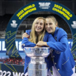 Switzerland's players Jil Teichmann and Belinda Bencic, right, pose with their trophy after defeating Australia to win the Billie Jean King Cup tennis finals, at the Emirates Arena in Glasgow, Scotland, Sunday, Nov. 13, 2022. (AP Photo/Kin Cheung)