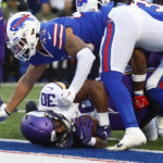 
              Minnesota Vikings fullback C.J. Ham (30) enters the end zone for a touchdown as Buffalo Bills linebacker Terrel Bernard (43) tries to defend in the second half of an NFL football game, Sunday, Nov. 13, 2022, in Orchard Park, N.Y. (AP Photo/Jeffrey T. Barnes)
            