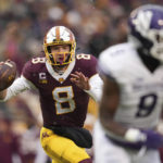 
              Minnesota quarterback Athan Kaliakmanis (8) looks to pass during the first half of an NCAA college football game against Northwestern, Saturday, Nov. 12, 2022, in Minneapolis. (AP Photo/Abbie Parr)
            