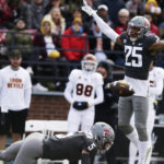 Washington State defensive back Jaden Hicks (25) celebrates a pass deflection by defensive back Derrick Langford Jr. (5) during the first half of an NCAA college football game against Arizona State, Saturday, Nov. 12, 2022, in Pullman, Wash. (AP Photo/Young Kwak)