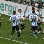 Argentina's Lionel Messi, second right, celebrates with teammates after scoring his side's first goal during the World Cup group C soccer match between Argentina and Saudi Arabia at the Lusail Stadium in Lusail, Qatar, Tuesday, Nov. 22, 2022. (AP Photo/Luca Bruno)
