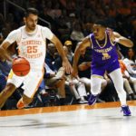 
              Tennessee guard Santiago Vescovi (25) drives past Tennessee Tech guard Ty Perry (0) during the first half of an NCAA college basketball game Monday, Nov. 7, 2022, in Knoxville, Tenn. (AP Photo/Wade Payne)
            