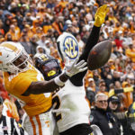 Tennessee wide receiver Ramel Keyton (80) tries to make a catch as he's defended by Missouri defensive back Ennis Rakestraw Jr. (2) during the second half of an NCAA college football game Saturday, Nov. 12, 2022, in Knoxville, Tenn. Rakestraw Jr. was called for pass interference on the play. (AP Photo/Wade Payne)