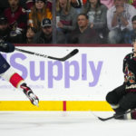 Arizona Coyotes defenseman Troy Stecher (51) slides over to block a shot by Florida Panthers left wing Rudolfs Balcers during the third period of an NHL hockey game in Tempe, Ariz., Tuesday, Nov. 1, 2022. The Coyotes won 3-1. (AP Photo/Ross D. Franklin)