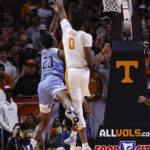 Tennessee forward Jonas Aidoo (0) blocks the shot of McNeese State forward Malachi Rhodes (23) during the first half of an NCAA college basketball game Wednesday, Nov. 30, 2022, in Knoxville, Tenn. (AP Photo/Wade Payne)