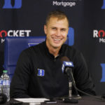 
              Duke head coach Jon Scheyer addresses the media after earning his first win as head coach of the Blue Devils in an NCAA college basketball game against Jacksonville in Durham, N.C., Monday, Nov. 7, 2022. (AP Photo/Ben McKeown)
            