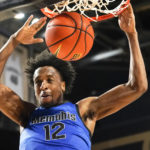 
              Memphis forward DeAndre Williams dunks against Vanderbilt in the first half of an NCAA college basketball game Monday, Nov. 7, 2022, in Nashville, Tenn. (AP Photo/Mark Humphrey)
            
