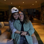
              Saskia Niño de Rivera, right, a Mexican civil rights activist, and her girlfriend Mariel Duayhe, a sports agent for Mexican soccer players, pose for a photo at their apartment in Mexico City, Tuesday, Nov. 8, 2022. Saskia Niño de Rivera contemplated privately proposing in Qatar at the World Cup during a game, but as the lesbian couple learned more about laws against same-sex relations in the conservative Gulf country, she decided against the idea. (AP Photo/Fernando Llano)
            