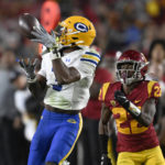 California's Jeremiah Hunter catches a pass against Southern California defensive back Ceyair Wright during the second half of an NCAA college football game Saturday, Nov. 5, 2022, in Los Angeles. (AP Photo/John McCoy)