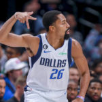 Dallas Mavericks point guard Spencer Dinwiddie celebrates after hitting a 3-point basket during the first half of the team's NBA basketball game against the Utah Jazz, Wednesday, Nov. 2, 2022, in Dallas. (AP Photo/Gareth Patterson)