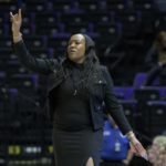 
              FILE - Then-Missouri State coach Amaka Agugua-Hamilton signals during the first half of the team's First Four game against Florida State in the NCAA women's college basketball tournament Thursday, March 17, 2022, in Baton Rouge, La. Agugua-Hamilton is now the women's basketball head coach at Virginia. (AP Photo/Matthew Hinton, File)
            
