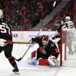 Ottawa Senators goaltender Cam Talbot (33) covers up the puck during third-period NHL hockey game action against the Vegas Golden Knights in Ottawa, Ontario, Thursday, Nov. 3, 2022. (Justin Tang/The Canadian Press via AP)