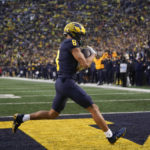 Michigan wide receiver Ronnie Bell (8) catches a nine-yard touchdown pass against Nebraska in the first half of an NCAA college football game in Ann Arbor, Mich., Saturday, Nov. 12, 2022. (AP Photo/Paul Sancya)
