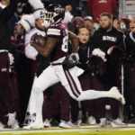 
              Mississippi State wide receiver Zavion Thomas (87) returns a punt 63-yards for a touchdown during the first half of an NCAA college football game against Georgia in Starkville, Miss., Saturday, Nov. 12, 2022. (AP Photo/Rogelio V. Solis)
            