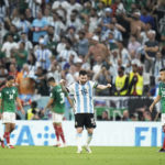 
              Argentina's Lionel Messi celebrates after his team won the World Cup group C soccer match between Argentina and Mexico, at the Lusail Stadium in Lusail, Qatar, Saturday, Nov. 26, 2022. (AP Photo/Hassan Ammar)
            