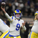 
              Los Angeles Rams quarterback Matthew Stafford (9) passes against the New Orleans Saints in the first half of an NFL football game in New Orleans, Sunday, Nov. 20, 2022. (AP Photo/Gerald Herbert)
            