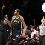 
              Brooklyn Nets forward Kevin Durant (7) reacts after scoring a 3-point shot against the Portland Trail Blazers during the first half of an NBA basketball game Sunday, Nov. 27, 2022, in New York. (AP Photo/Jessie Alcheh)
            