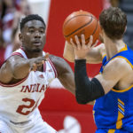 
              Indiana forward Jordan Geronimo (22) defends against Morehead State guard Jake Wolfe (24) during the second half of an NCAA college basketball game Monday, Nov. 7, 2022, in Bloomington, Ind. (AP Photo/Doug McSchooler)
            