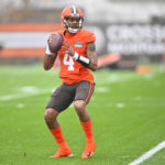 Cleveland Browns quarterback Deshaun Watson looks to throw a pass during an NFL football practice at the team's training facility Wednesday, Nov. 16, 2022, in Berea, Ohio. (AP Photo/David Richard)