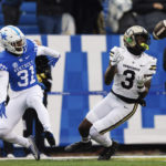 
              Vanderbilt wide receiver Quincy Skinner Jr. (3) catches a pass near the end zone late in the fourth quarter during the second half of an NCAA college football game against Kentucky in Lexington, Ky., Saturday, Nov. 12, 2022. (AP Photo/Michael Clubb)
            