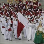 FILE - Athletes from Qatar march into the stadium during the opening ceremony for the 17th Asian Games in Incheon, South Korea,Friday, Sept. 19, 2014. Qatar will host the 2022 FIFA World Cup but soccer isn't the only sport played in the Gulf Arab country. From traditional pursuits to worldwide competitions, Qatar increasingly has marketed itself as a host for sports of all sorts. (AP Photo/Dita Alangkara, File)