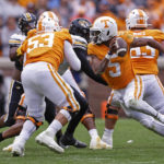 Tennessee quarterback Hendon Hooker (5) throws to a receiver during the first half of an NCAA college football game against Missouri Saturday, Nov. 12, 2022, in Knoxville, Tenn. (AP Photo/Wade Payne)