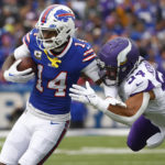 Buffalo Bills wide receiver Stefon Diggs (14) is brought down by Minnesota Vikings linebacker Eric Kendricks (54) in the first half of an NFL football game, Sunday, Nov. 13, 2022, in Orchard Park, N.Y. (AP Photo/Jeffrey T. Barnes)
