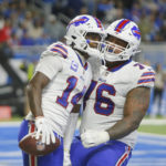 
              Buffalo Bills wide receiver Stefon Diggs (14) is greeted by guard Rodger Saffold after a 5-yard reception for a touchdown during the second half of an NFL football game against the Detroit Lions, Thursday, Nov. 24, 2022, in Detroit. (AP Photo/Duane Burleson)
            