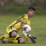 
              Cristhian Loor, goalkeeper of the Independiente del Valle U-17 youth team, blocks a ball during a match against Mushuc Runa in Tisaleo, Ecuador, Saturday, Sept. 3, 2022. The club trains young men in soccer while providing them with up to a high school graduation and has become a key source for the country’s national soccer team. (AP Photo/Dolores Ochoa)
            