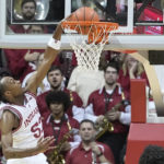 Indiana guard Tamar Bates (53) dunks during the first half of an NCAA college basketball game against Jackson State, Friday, Nov. 25, 2022, in Bloomington, Ind. (AP Photo/Darron Cummings)
