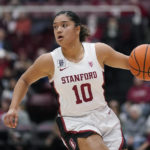 
              Stanford guard Talana Lepolo (10) brings the ball up against Santa Clara during the first half of an NCAA college basketball game in Stanford, Calif., Wednesday, Nov. 30, 2022. (AP Photo/Jeff Chiu)
            
