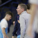 
              Gonzaga head coach Mark Few directs his team during the first half of an NCAA college basketball game against North Florida, Monday, Nov. 7, 2022, in Spokane, Wash. (AP Photo/Young Kwak)
            