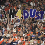 
              Fans hold up a sign for Houston Astros manager Dusty Baker Jr. during the first inning in Game 6 of baseball's World Series between the Houston Astros and the Philadelphia Phillies on Saturday, Nov. 5, 2022, in Houston. (AP Photo/David J. Phillip)
            