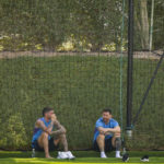 Lionel Messi, right, and Rodrigo De Paul talks during a training session of Argentina's national soccer team in Doha, Qatar, Sunday, Nov. 27, 2022. (AP Photo/Jorge Saenz)