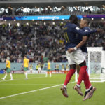 
              France's Kylian Mbappe, right, celebrates with his teammate Ousmane Dembele after scoring against Australia during the World Cup group D soccer match between France and Australia, at the Al Janoub Stadium in Al Wakrah, Qatar, Tuesday, Nov. 22, 2022. (AP Photo/Christophe Ena)
            