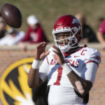 Arkansas quarterback KJ Jefferson warms up before the start of an NCAA college football game against the Missouri Friday, Nov. 25, 2022, in Columbia, Mo. (AP Photo/L.G. Patterson)