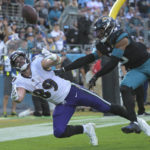 
              Jacksonville Jaguars safety Andre Cisco (5) breaks up a pass intended for Baltimore Ravens tight end Mark Andrews (89) during the second half of an NFL football game, Sunday, Nov. 27, 2022, in Jacksonville, Fla. (AP Photo/Phelan M. Ebenhack)
            