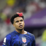 
              Weston McKennie of the United States looks up during the World Cup group B soccer match between England and The United States, at the Al Bayt Stadium in Al Khor , Qatar, Friday, Nov. 25, 2022. (AP Photo/Luca Bruno)
            