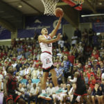 Arizona guard Kerr Kriisa (25) makes a layup over San Diego State during the second half of an NCAA college basketball game, Tuesday, Nov. 22, 2022, in Lahaina, Hawaii. (AP Photo/Marco Garcia)