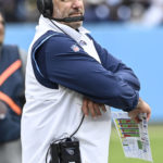 
              Tennessee Titans head coach Mike Vrabel walks the sidelines during the first half of an NFL football game against the Cincinnati Bengals, Sunday, Nov. 27, 2022, in Nashville, Tenn. (AP Photo/Mark Zaleski)
            