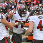 
              Tampa Bay Buccaneers tight end Ko Kieft (41) celebrates his touchdown with Robert Hainsey during the second half of an NFL football game against the Cleveland Browns in Cleveland, Sunday, Nov. 27, 2022. (AP Photo/David Richard)
            