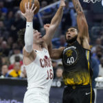 
              Cleveland Cavaliers forward Cedi Osman (16) shoots against Golden State Warriors forward Anthony Lamb (40) during the first half of an NBA basketball game in San Francisco, Friday, Nov. 11, 2022. (AP Photo/Jeff Chiu)
            