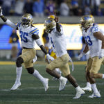 
              UCLA linebacker Carl Jones Jr. (35) celebrates after recovering a California fumble during the second half of an NCAA college football game in Berkeley, Calif., Friday, Nov. 25, 2022. (AP Photo/Jed Jacobsohn)
            