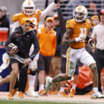 Tennessee wide receiver Jalin Hyatt (11) runs for a touchdown during the second half of an NCAA college football game against Missouri Saturday, Nov. 12, 2022, in Knoxville, Tenn. (AP Photo/Wade Payne)
