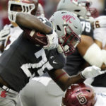 Washington State running back Nakia Watson (25) carries the ball during the second half of an NCAA college football game against Arizona State, Saturday, Nov. 12, 2022, in Pullman, Wash. Washington State won 28-18. (AP Photo/Young Kwak)