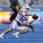 BYU wide receiver Puka Nacua (12) catches the ball against Boise State in the first half of an NCAA college football game, Saturday, Nov. 5, 2022, in Boise, Idaho. (AP Photo/Steve Conner)