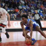 Duke guard Jeremy Roach, right, picks up a loose ball in front of Oregon State guard Nick Krass during the first half of an NCAA college basketball game in the Phil Knight Legacy tournament in Portland, Ore., Thursday, Nov. 24, 2022. (AP Photo/Craig Mitchelldyer)
