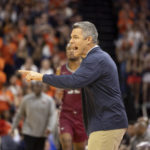 
              Virginia head coach Tony Bennett yells at his players during the first half of an NCAA college basketball game against North Carolina Central in Charlottesville, Va., Monday, Nov. 7, 2022. (AP Photo/Mike Kropf)
            